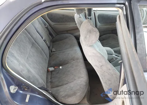 1999 Toyota Corolla Le z USA, uszkodzony, nr VIN 2T1BR12E8XC109982